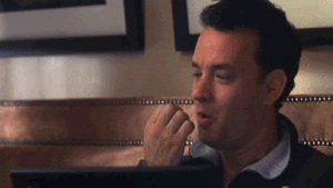 Actor Tom Hanks preparing to type on his laptop