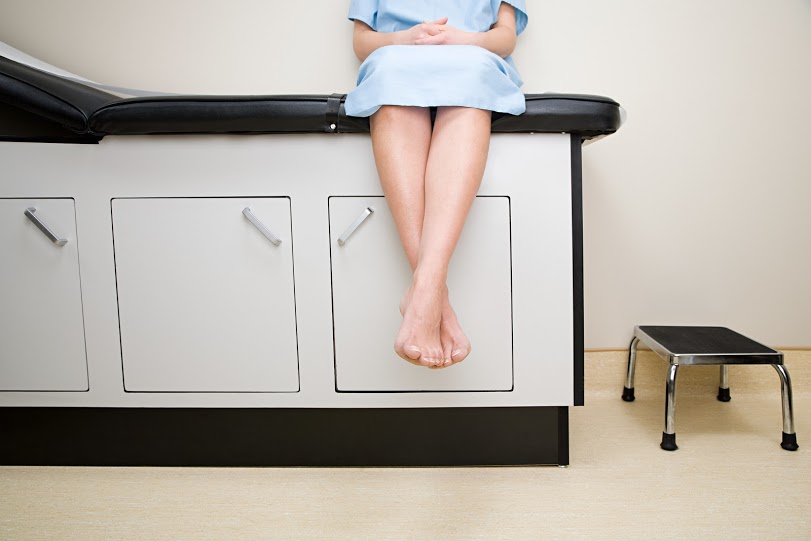 Medical Patient Sitting On Treatment Couch - Search Influence