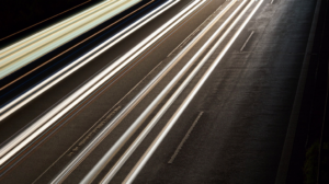 Open exposure capture of cars driving on a road at night - Search Influence