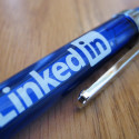 LinkedIn pen resting on desk - Search Influence