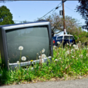 Old TV sitting in weeds - Search Influence