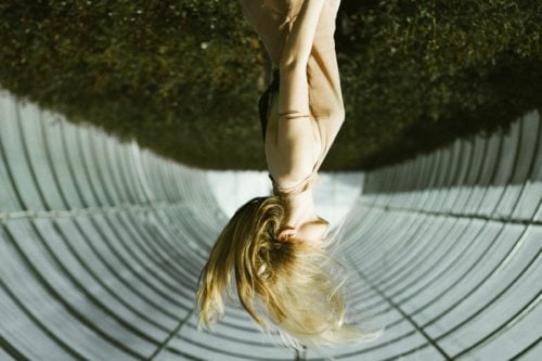 Girl Walking Upside Down - Search Influence