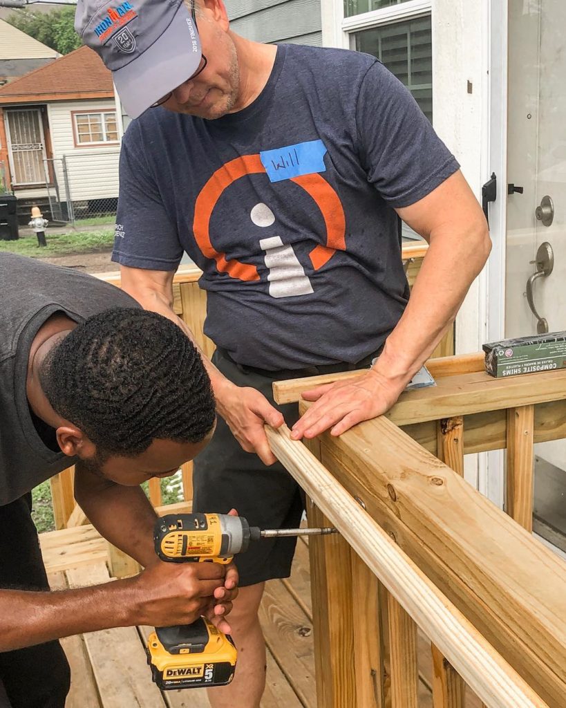 Alula Amare with great waves and Search Influence CEO Will Scott at Rebuilding Together New Orleans