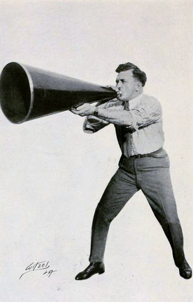 Man screaming into megaphone about branding