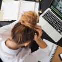 Worker frustrated at desk because no more Google Ads average position