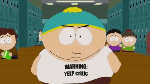 Eric Cartman walking down the halls in a Yelp Critic shirt