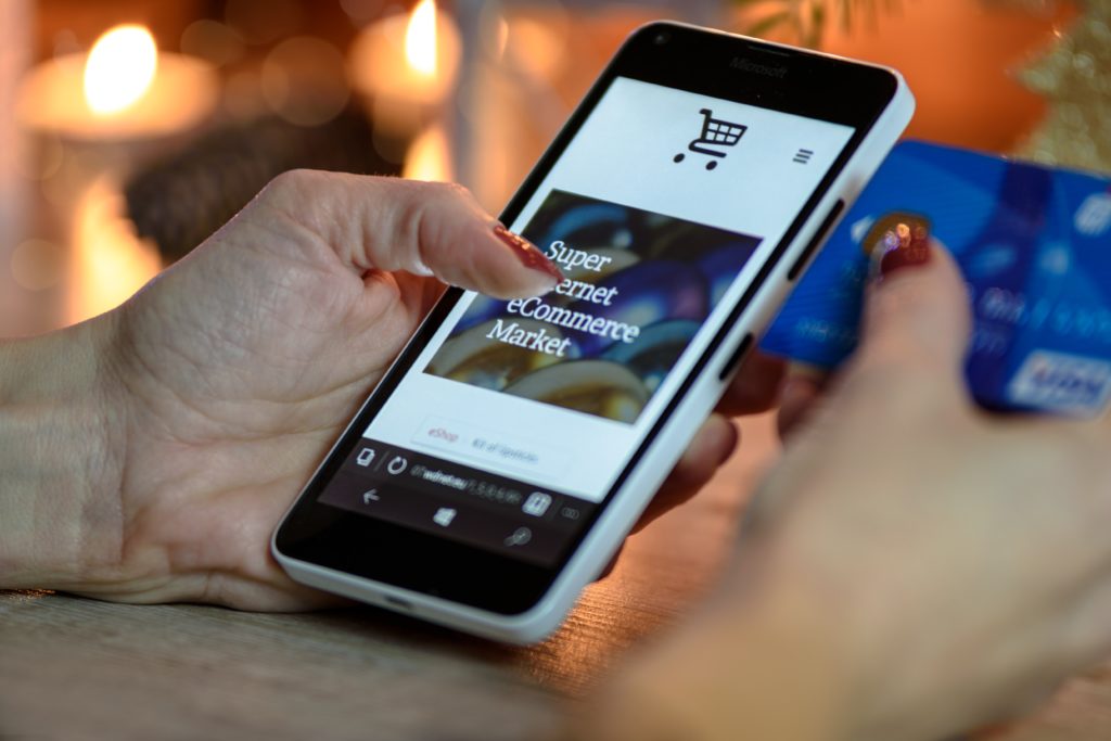 Person shopping using mobile device during Black Friday