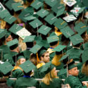 College graduation ceremony with graduates in caps and gowns