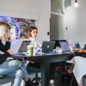 A group of people working at a table