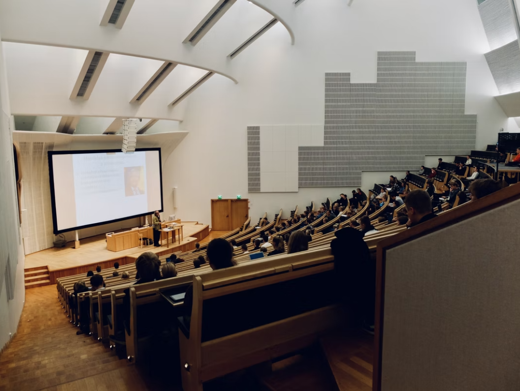 Professor giving lecture in a college lecture hall