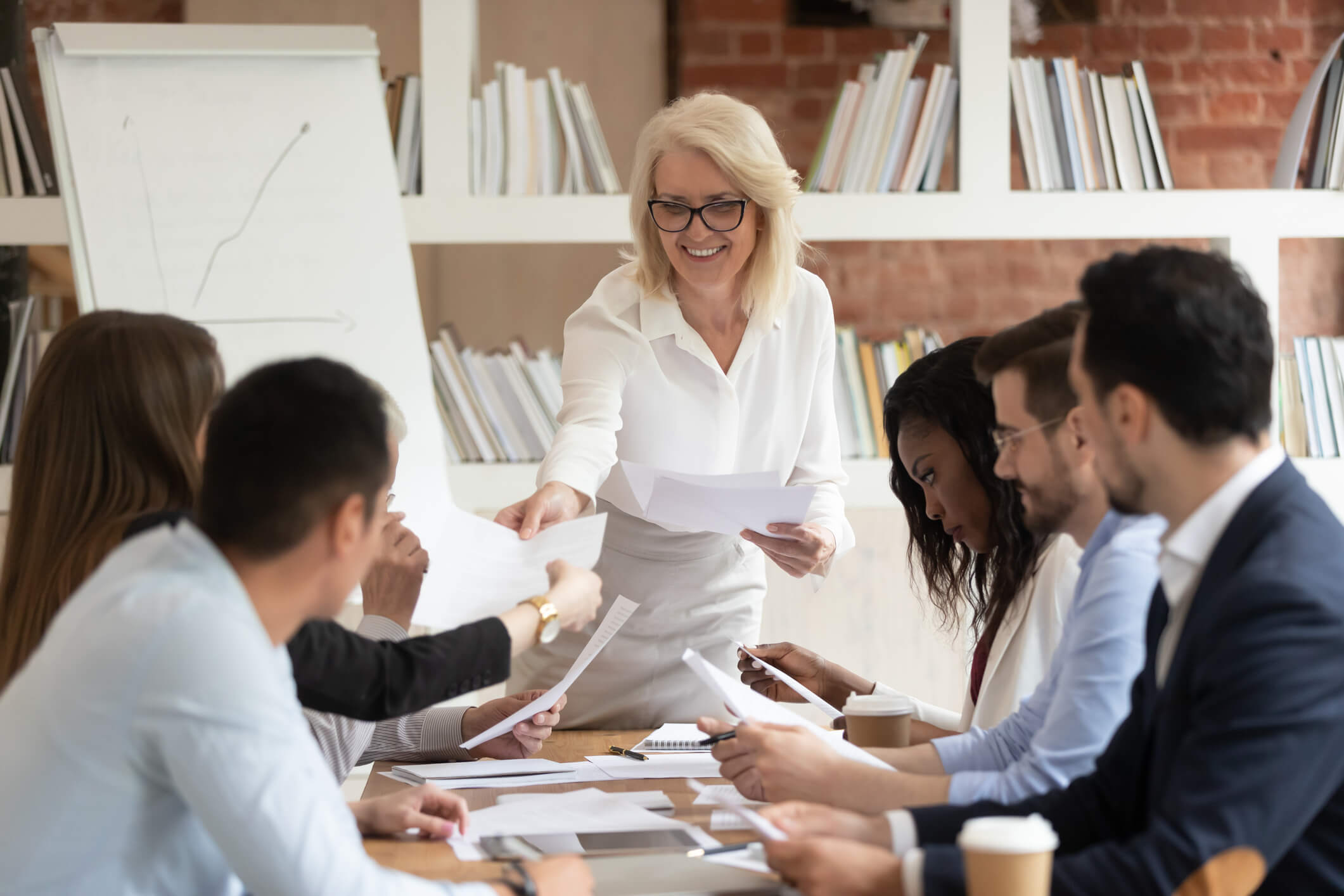A group of marketers working at a higher education digital marketing agency.